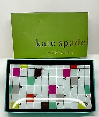 Designer item from Hermès or Kate Spade crossword clue